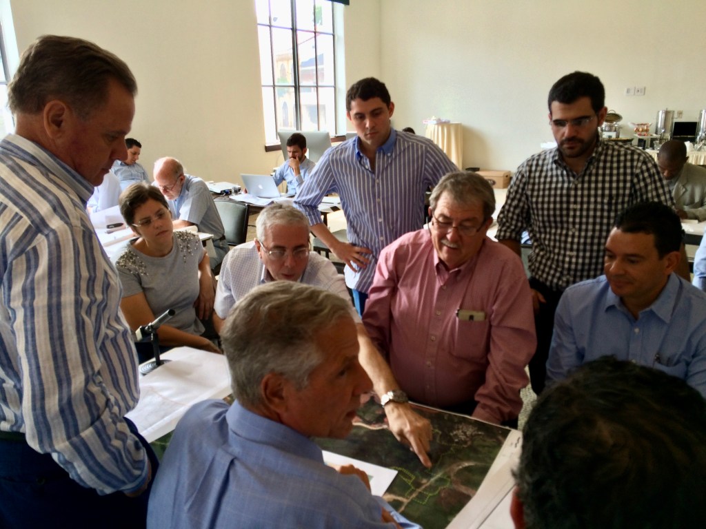 The design team working over the site plan during the 2015 charrette